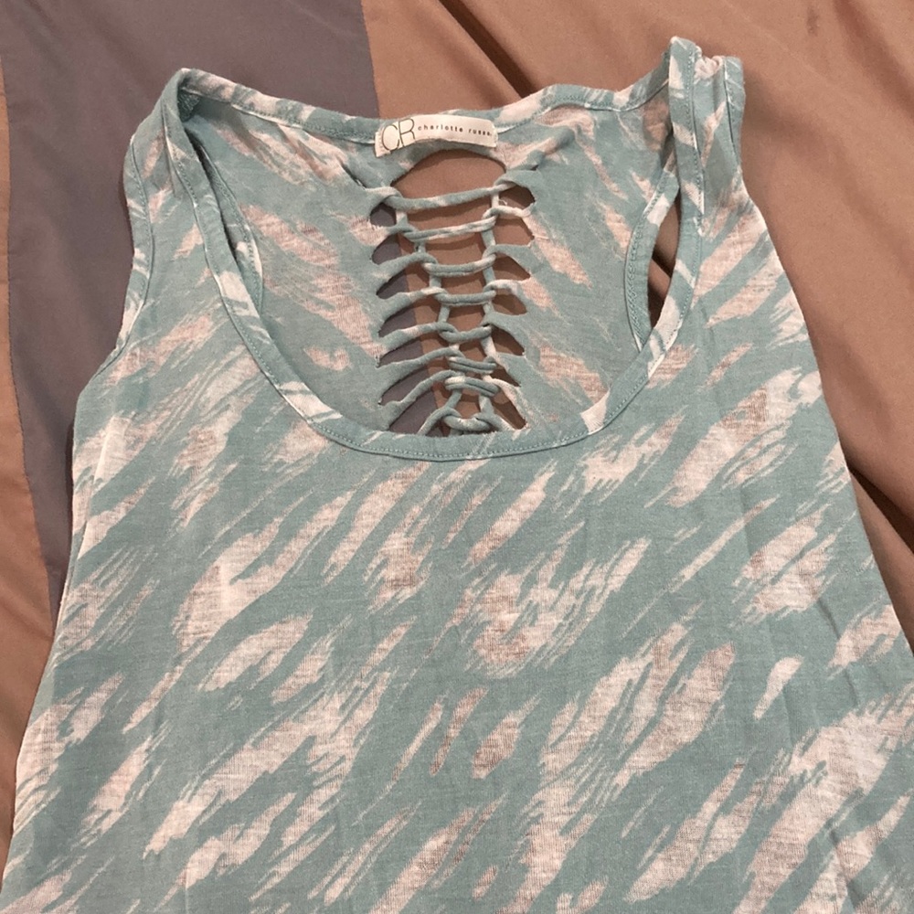 Small Charlotte Russe blue and white patterned tank top with open back.